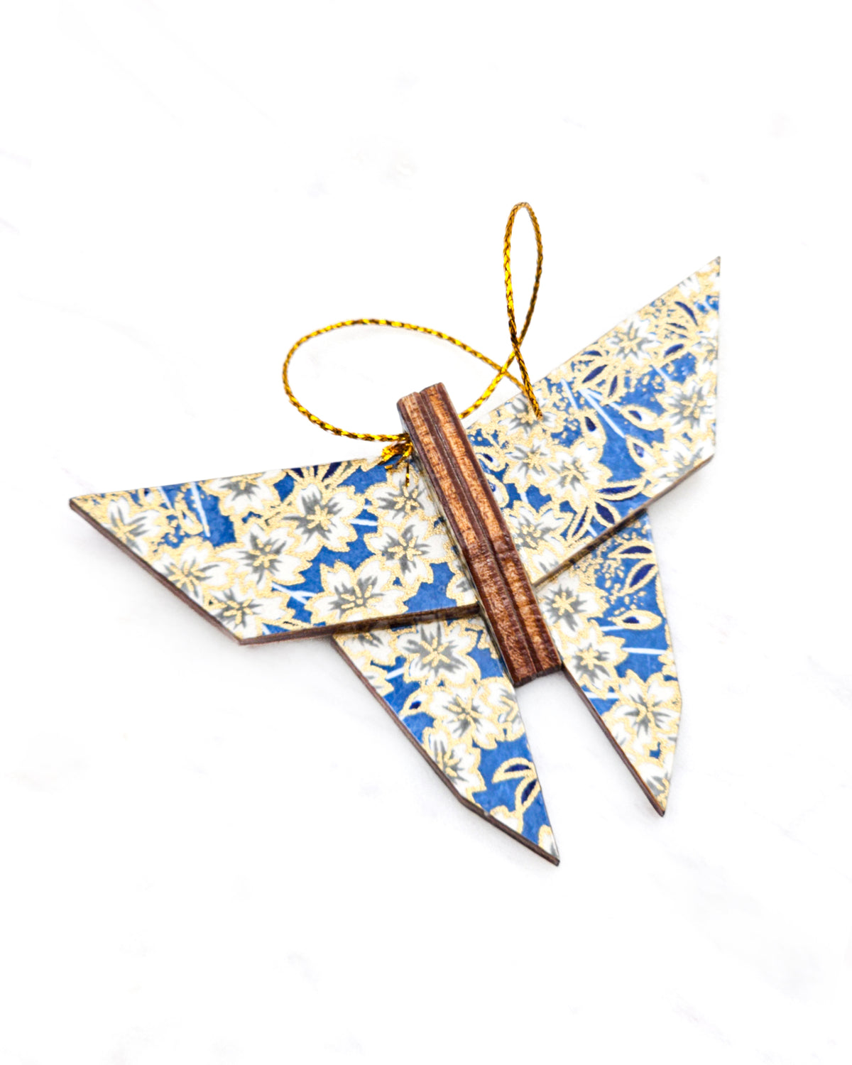 Small wooden origami butterfly ornament featuring white cherry blossoms on a blue background with metallic gold details.