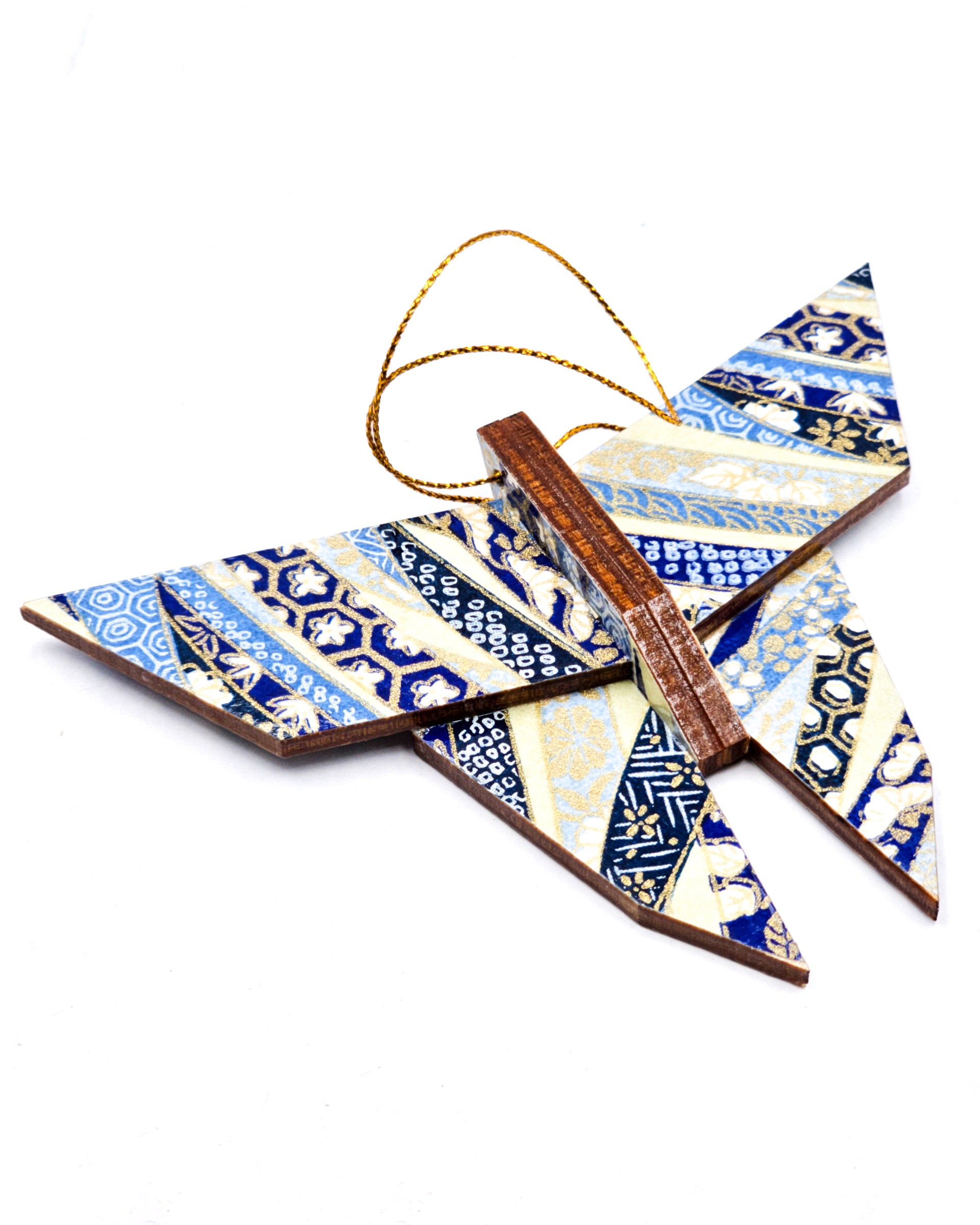 Wooden origami butterfly ornament featuring blue floral ribbons on a beige background with metallic gold accents.