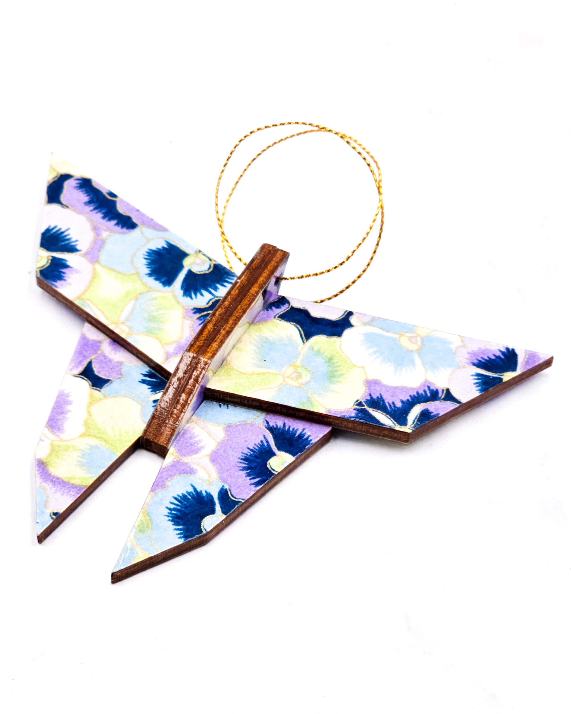 Wooden origami butterfly ornament featuring purple, blue, and green pansies with metallic gold accents.
