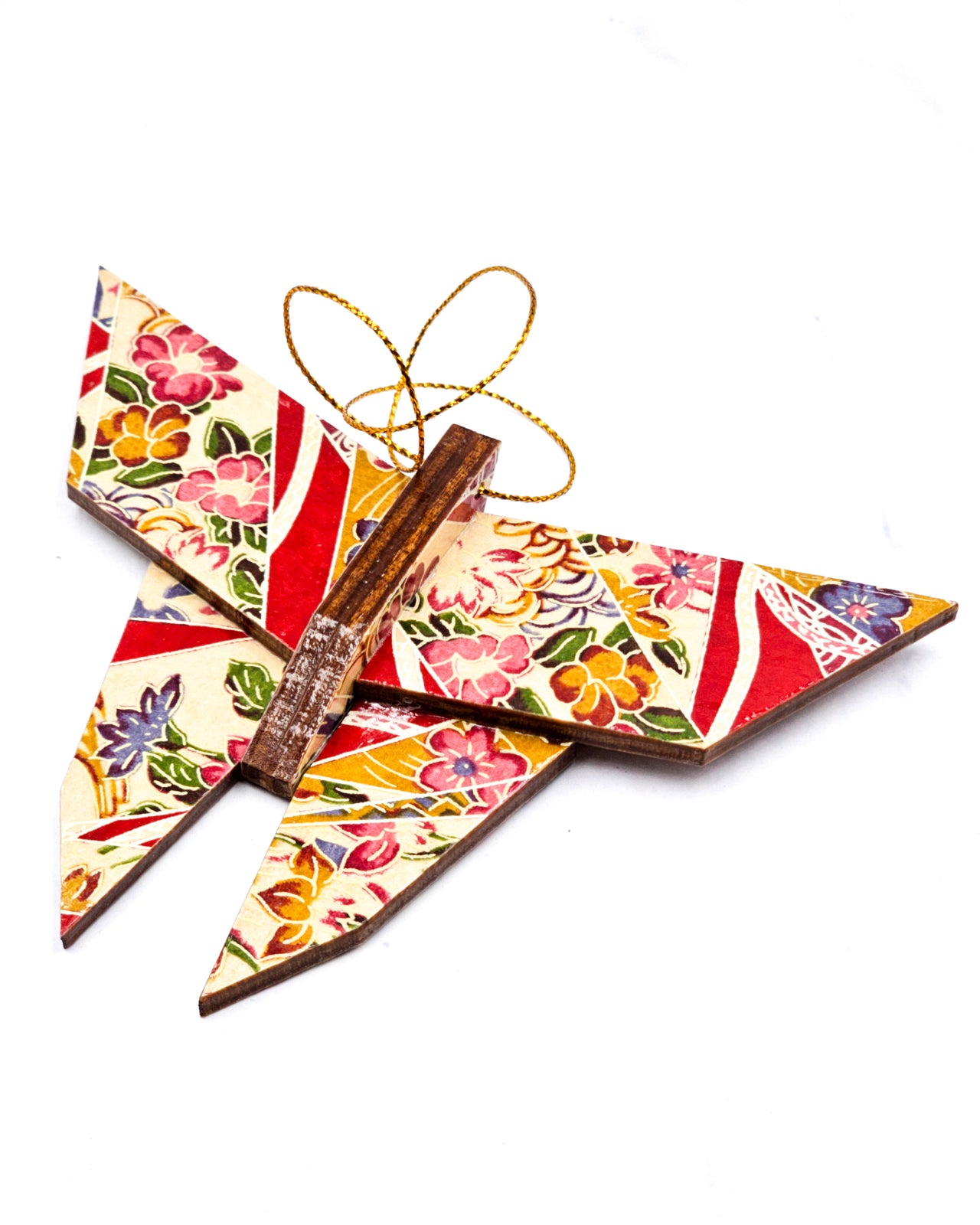 Wooden origami butterfly ornament featuring red floral ribbons on a beige background.