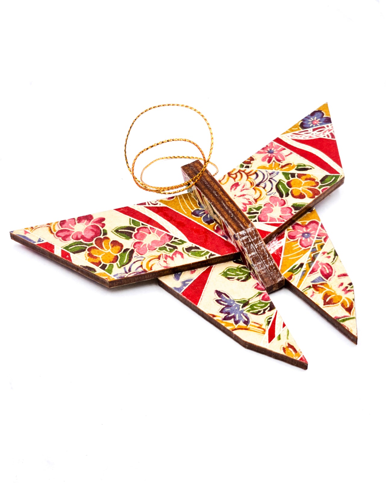 Wooden origami butterfly ornament featuring red floral ribbons on a beige background.