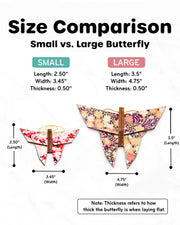 A size comparison display of the small and large wooden origami butterfly ornaments.