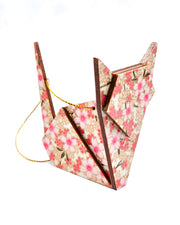 Wooden origami cat ornament featuring pink cherry blossoms on a white background with metallic gold accents.