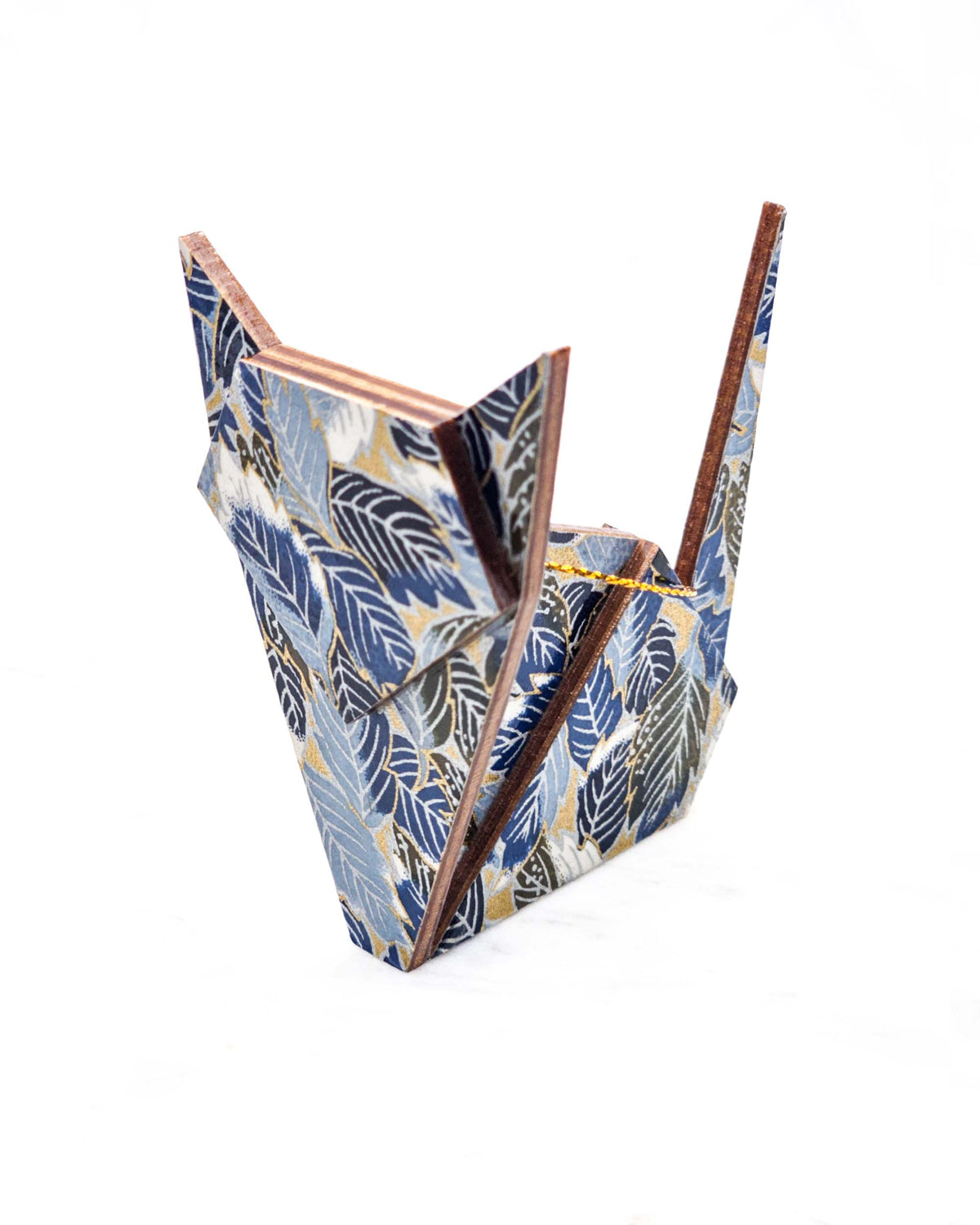 Large wooden origami cat ornament featuring blue, black, and white leaves on a metallic gold background.