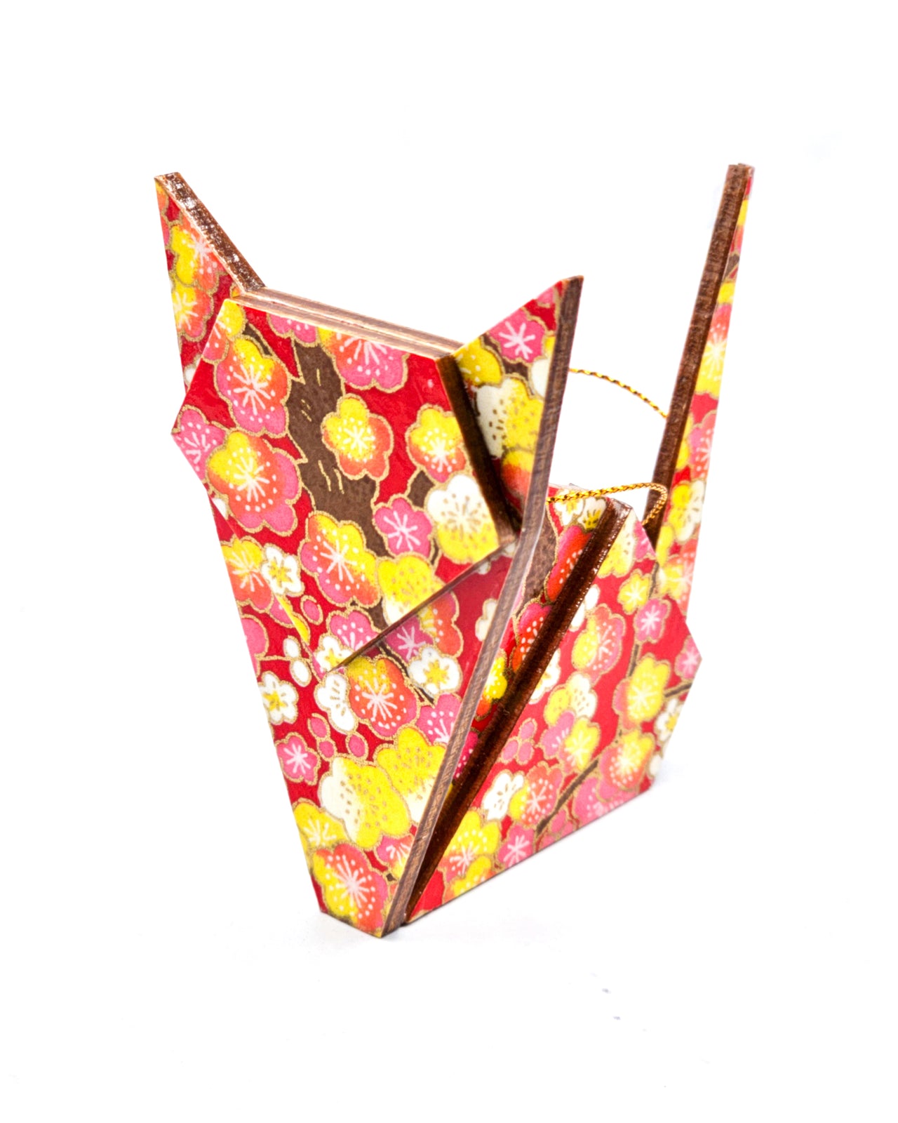 Wooden origami cat ornament featuring pink and yellow plum blossoms on a red background with metallic gold accents.