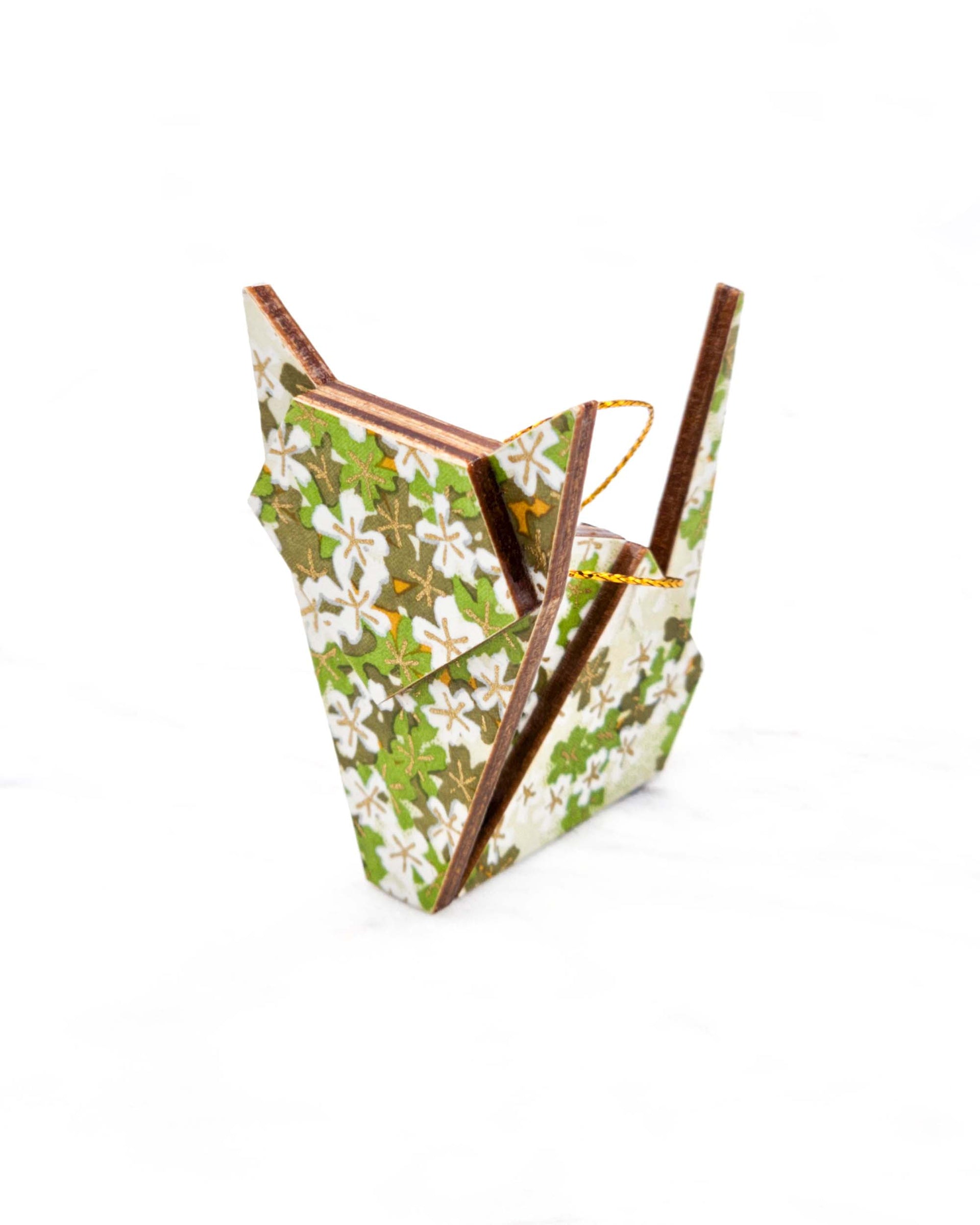 Small wooden origami cat ornament featuring green and white cherry blossoms with metallic gold details.