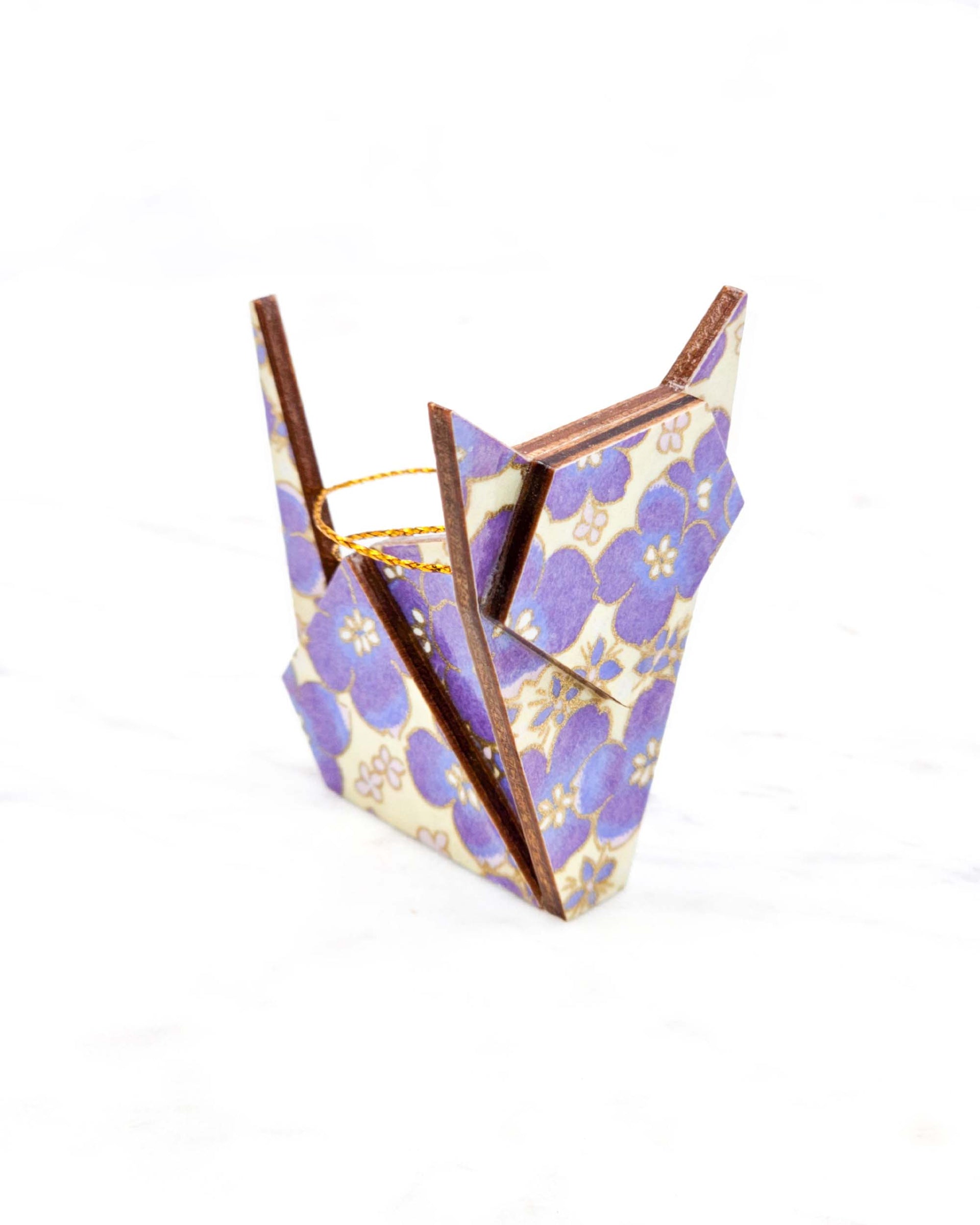 Small wooden origami cat ornament featuring purple cherry blossoms on a cream background with metallic gold details.