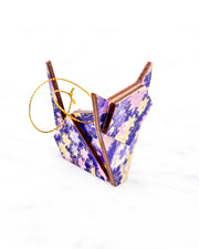 Small wooden origami cat ornament featuring purple and yellow flowers and maple leaves on a purple and white background with metallic gold details.