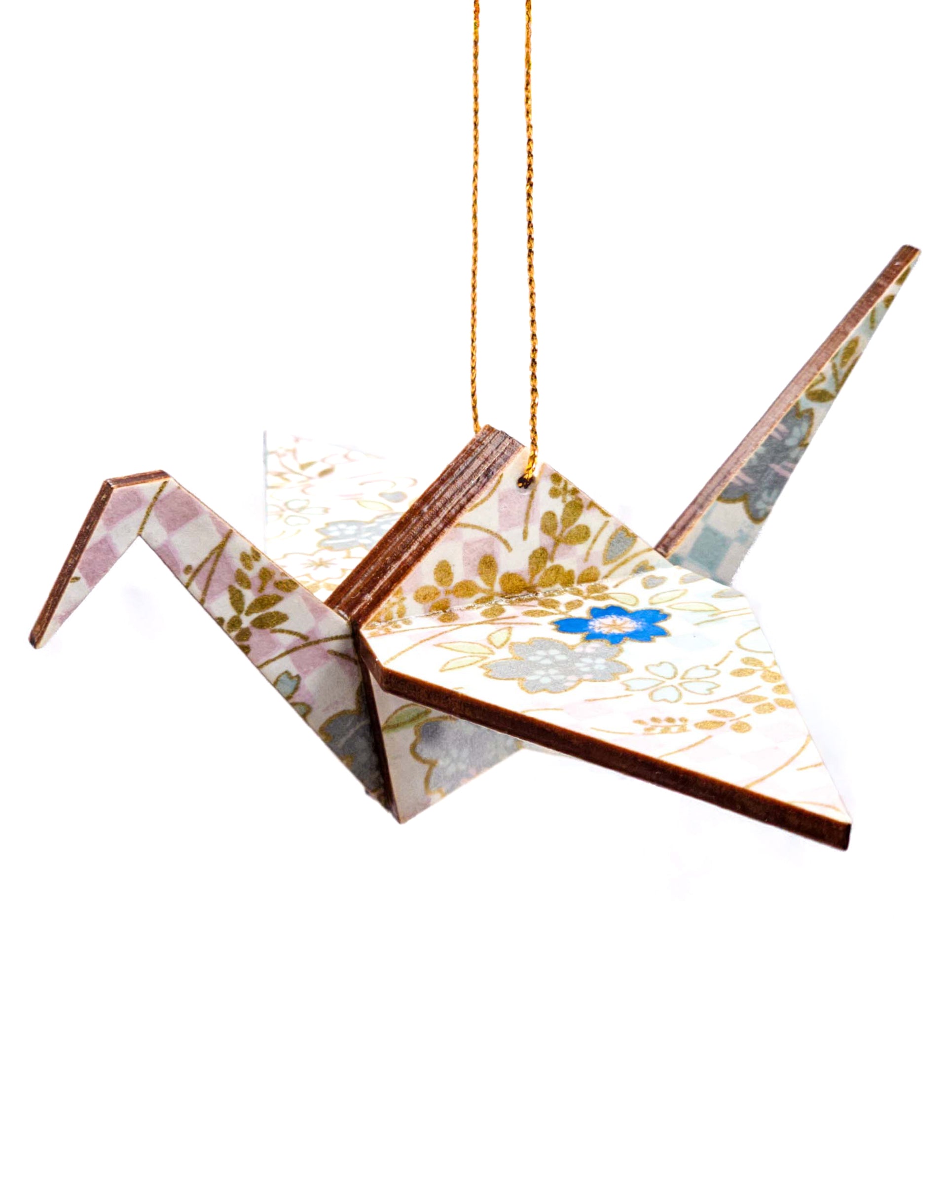 Wooden origami crane ornament featuring blue and silver cherry blossoms and blue and purple ichimatsu pattern on a white background with metallic gold accents.