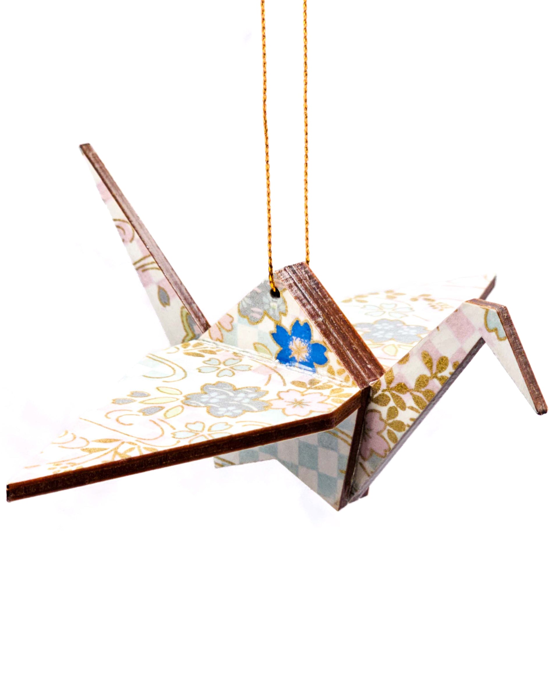 Wooden origami crane ornament featuring blue and silver cherry blossoms and blue and purple ichimatsu pattern on a white background with metallic gold accents.