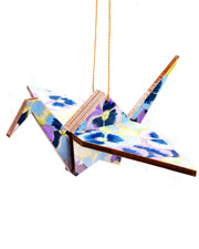 Wooden origami crane ornament featuring purple, blue, and green pansies with metallic gold accents.