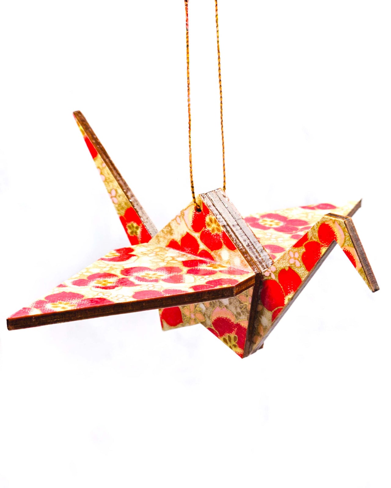 Wooden origami crane ornament featuring red cherry blossoms on a brown background with metallic gold accents.