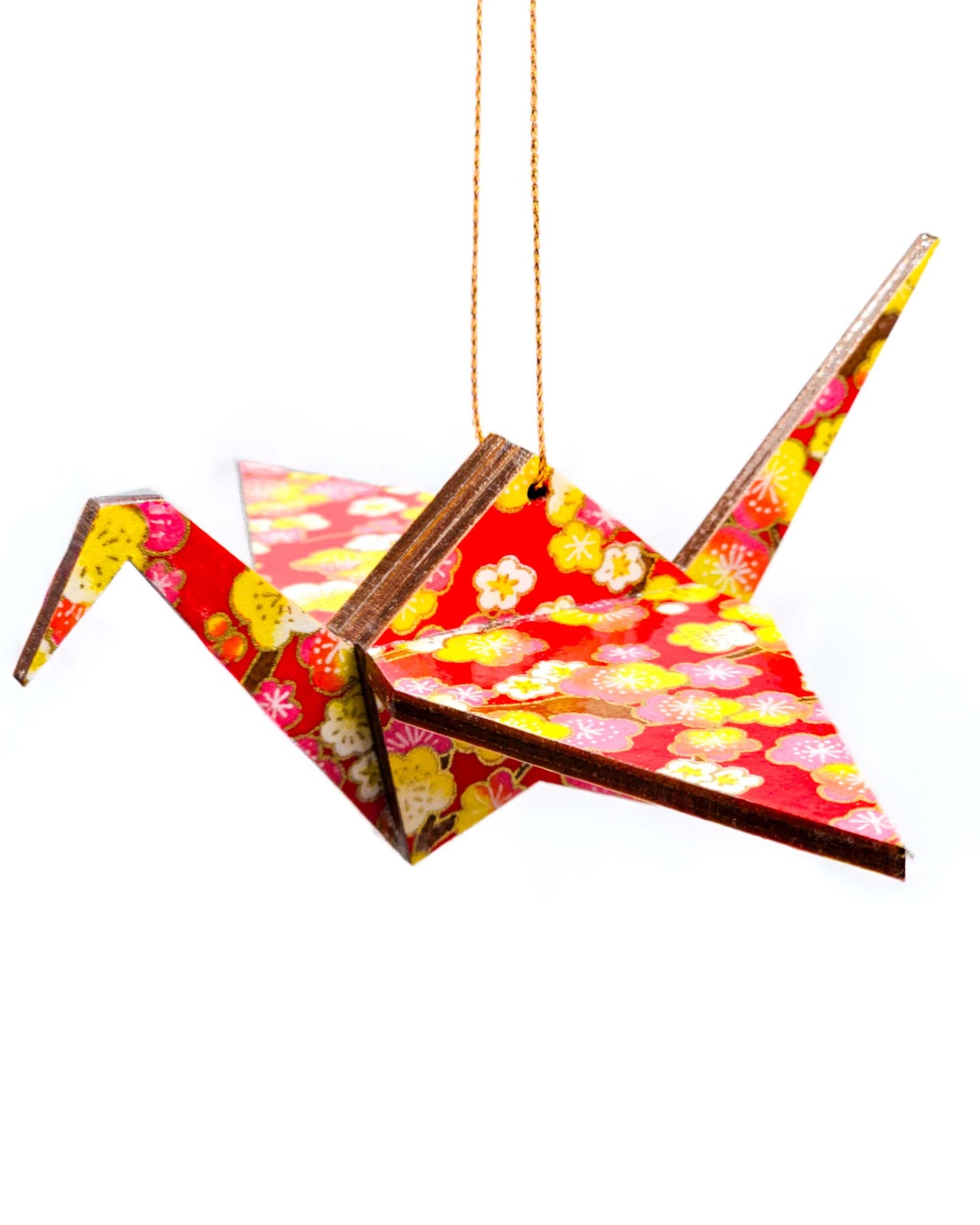 Wooden origami crane ornament featuring pink and yellow plum blossoms on a red background with metallic gold accents.