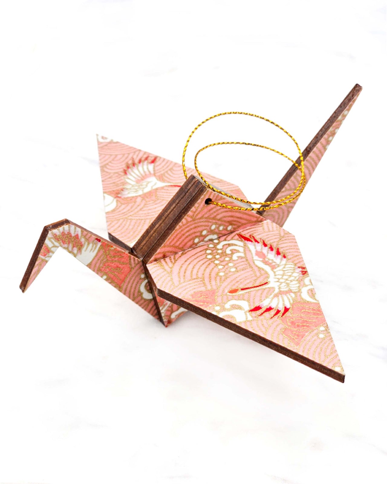 Large wooden origami crane ornament featuring pink and white cranes flying over pink waves with metallic gold details.
