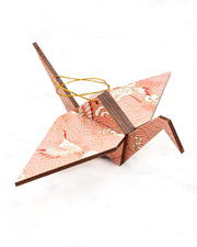 Large wooden origami crane ornament featuring pink and white cranes flying over pink waves with metallic gold details.