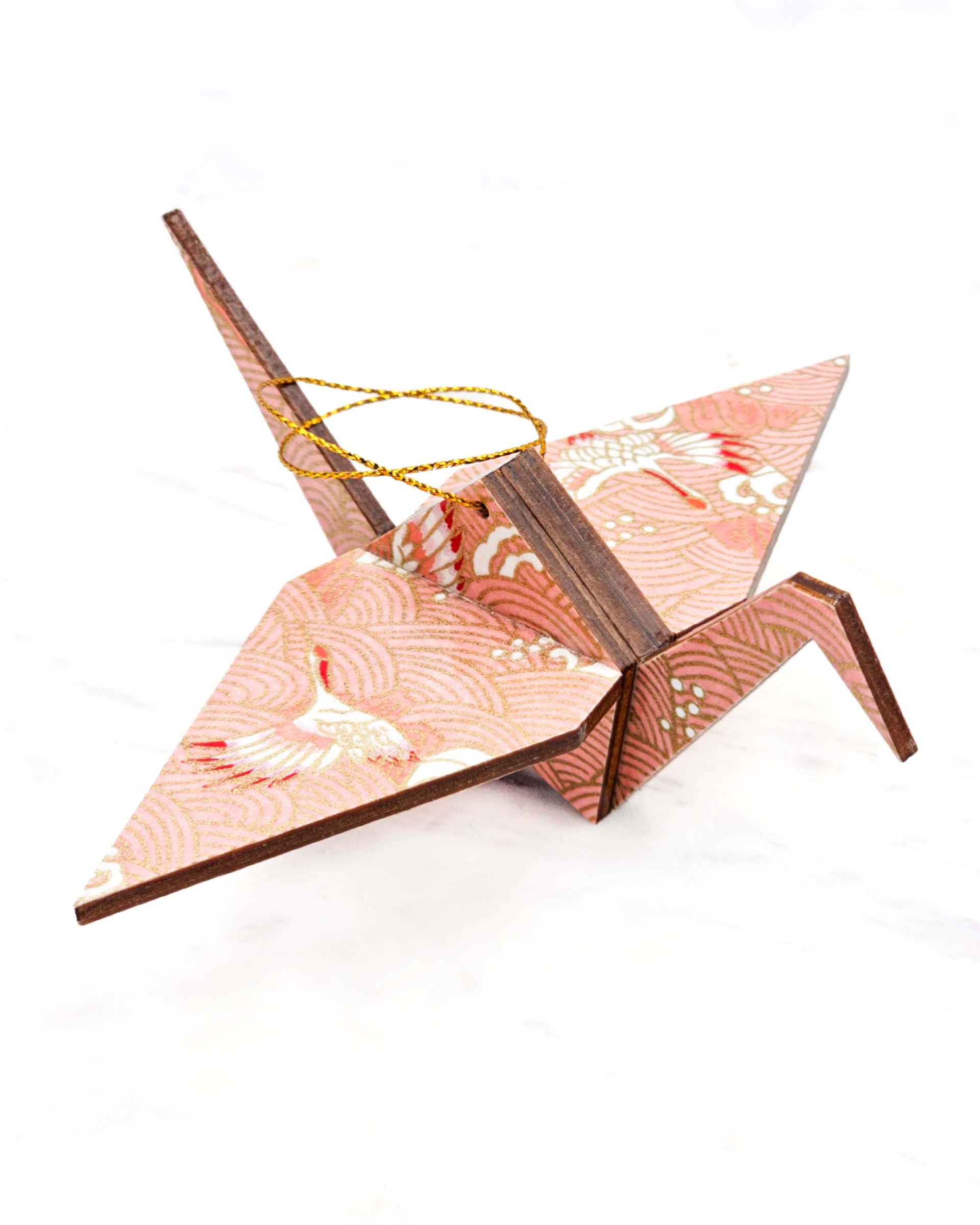 Large wooden origami crane ornament featuring pink and white cranes flying over pink waves with metallic gold details.