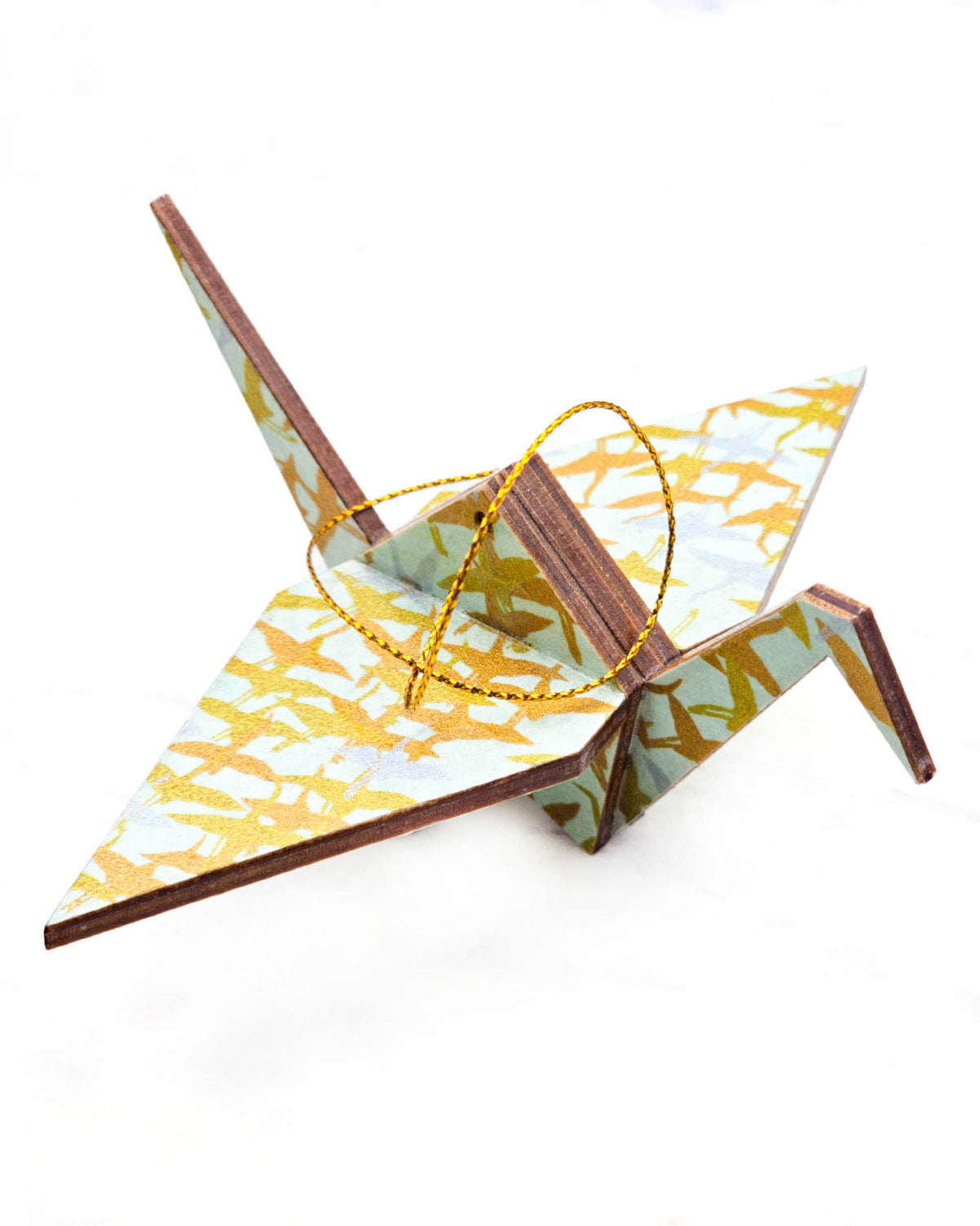 Large wooden origami crane ornament featuring small flying gold and silver cranes on a turquoise background with metallic gold details.