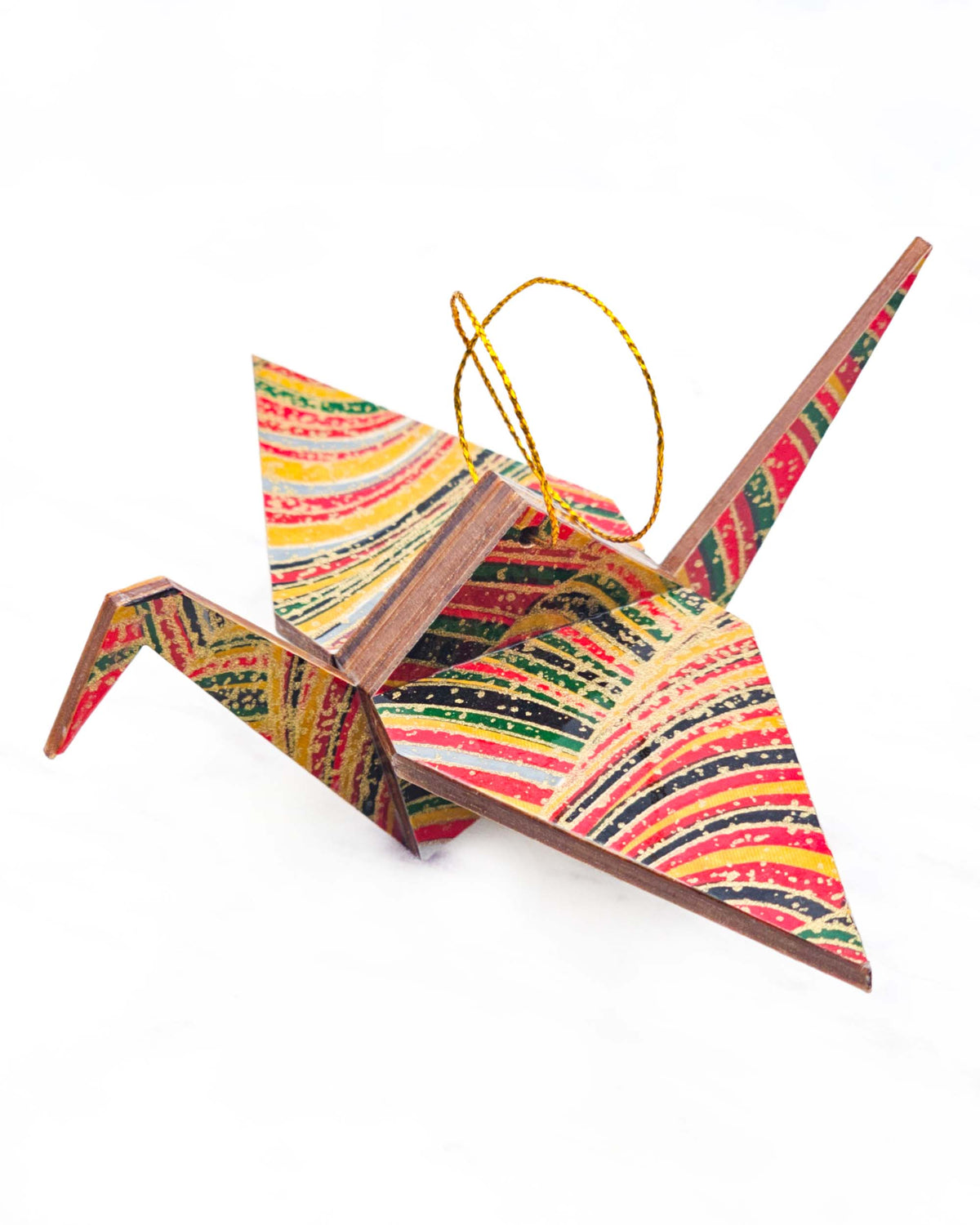 Large wooden origami crane ornament featuring colorful rolling hills in red, yellow, green, black, and gray with metallic gold details.