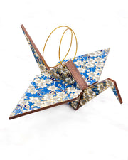 Large wooden origami crane ornament featuring white cherry blossoms on a blue background with metallic gold accents.