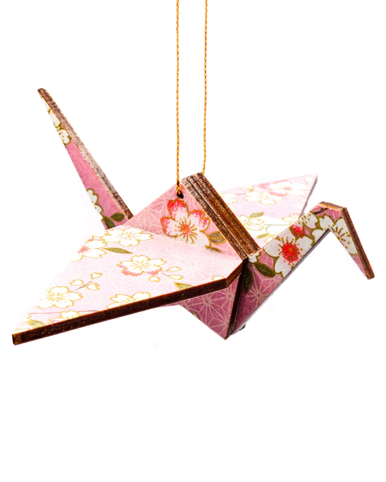 Wooden origami crane ornament featuring pink and white cherry blossoms on a light pink background with metallic gold accents.