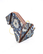 Large wooden origami dog ornament featuring blue and white overlapping parasols with metallic gold details.