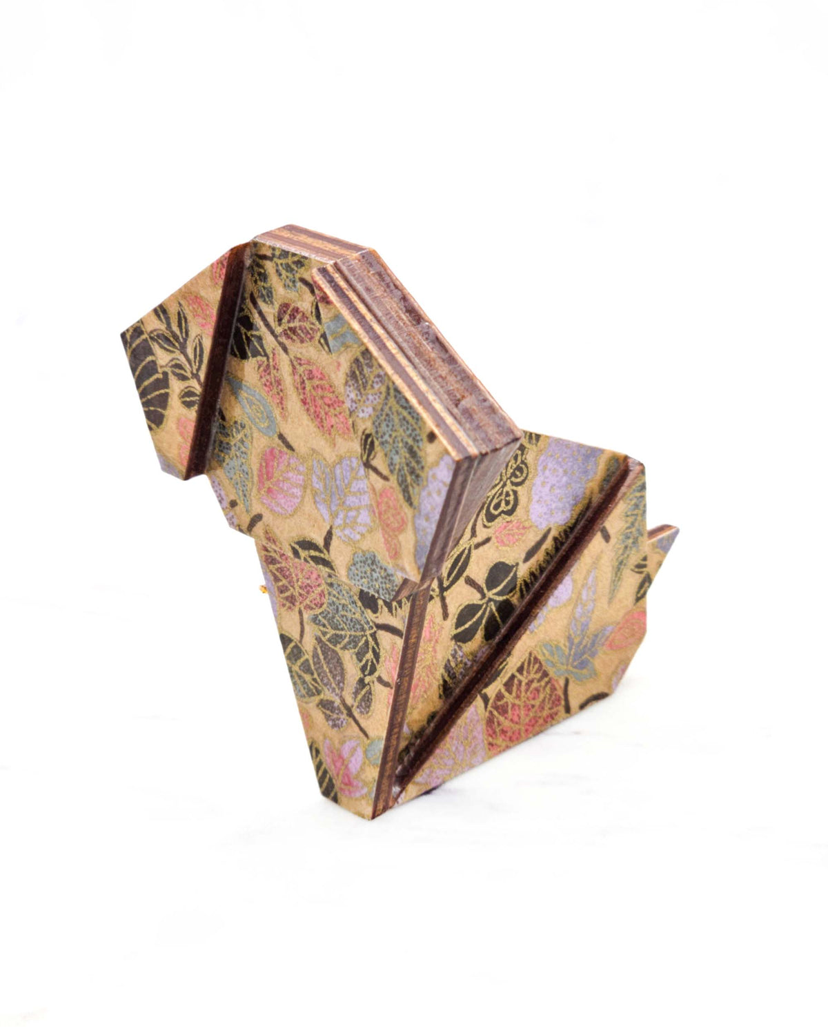 Large wooden origami dog ornament featuring leaves in dark brown, pink, purple, and green on a light golden brown background with metallic gold details.