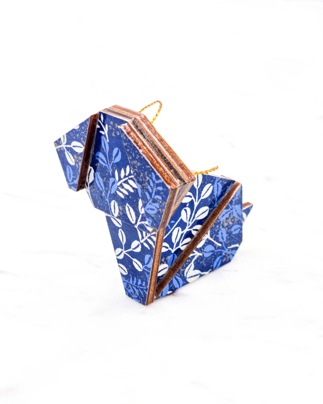 Small wooden origami dog ornament featuring blue and white hagi (bush clover) on a blue background with metallic gold details.
