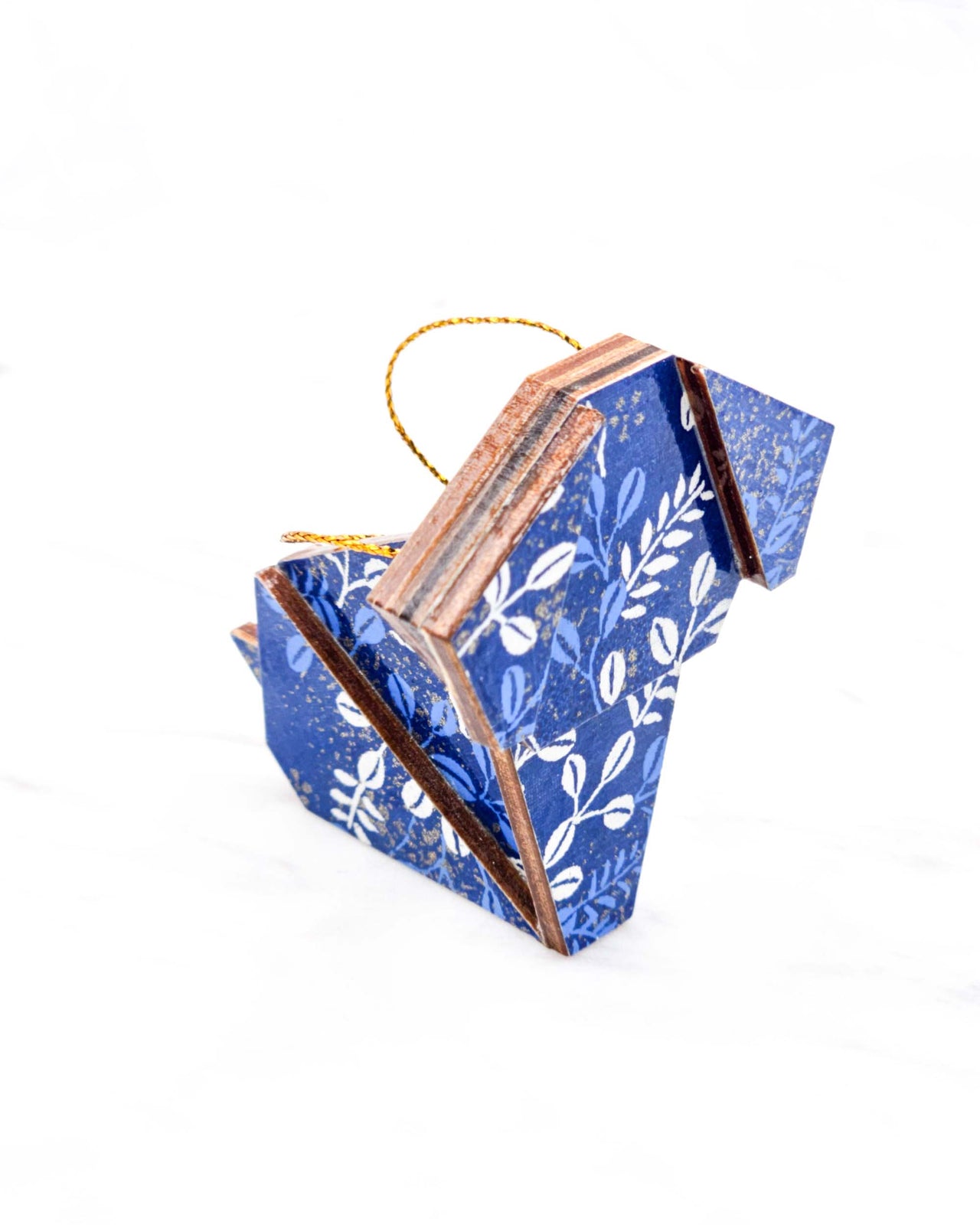 Small wooden origami dog ornament featuring blue and white hagi (bush clover) on a blue background with metallic gold details.