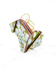 Small wooden origami dog ornament featuring light blue and white plum blossoms with brown branches on a green background with metallic gold details.
