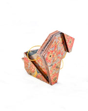 Small wooden origami dog ornament featuring orange flowers on a brown background with metallic gold details.