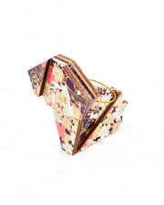 Small wooden origami dog ornament featuring pink and cream cherry blossoms on a dark purple background with metallic gold details.
