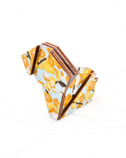 Small wooden origami dog ornament featuring yellow plum blossoms and brown branches on a light blue background with metallic gold details.