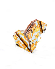 Small wooden origami dog ornament featuring yellow plum blossoms and brown branches on a light blue background with metallic gold details.