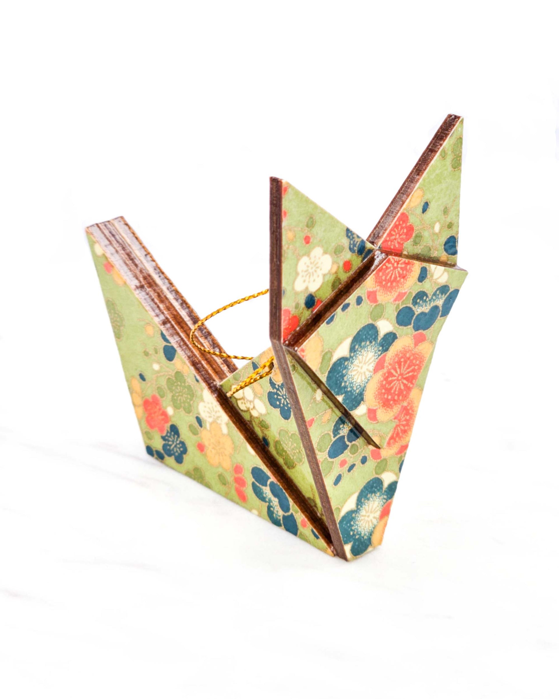 Large wooden origami fox ornament featuring orange, blue, and white plum blossoms on a green background with metallic gold details.