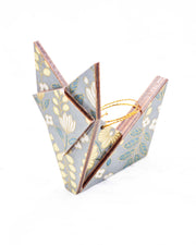 Large wooden origami fox ornament featuring yellow and white flowers with green leaves and yellow wisteria on a gray background with metallic gold details.