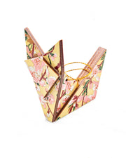 Large wooden origami fox ornament featuring pink and white plum blossoms with dark brown branches and green leaves on a beige background with metallic gold details.
