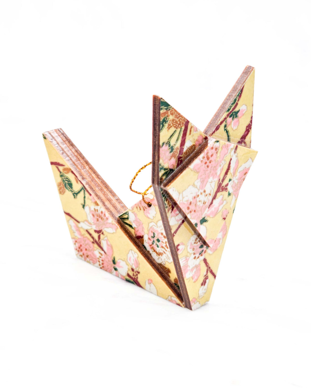 Large wooden origami fox ornament featuring pink and white plum blossoms with dark brown branches and green leaves on a beige background with metallic gold details.