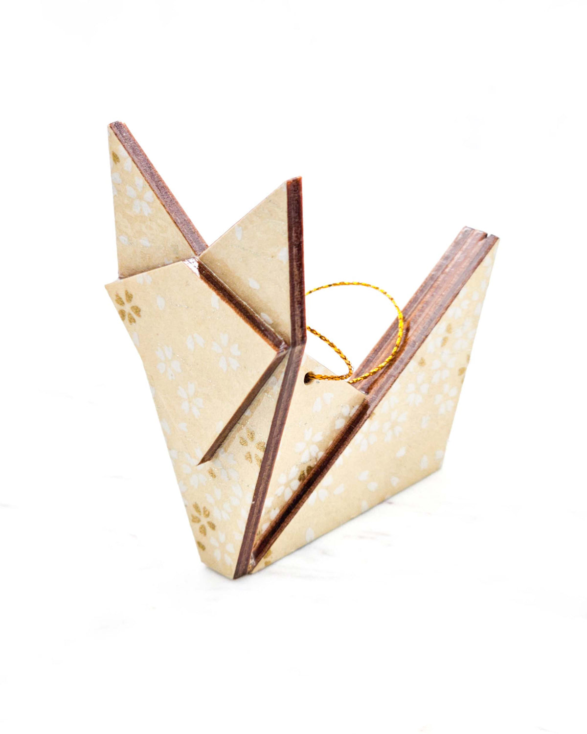 Large wooden origami fox ornament featuring metallic small white and gold cherry blossoms on a pearlescent cream background with metallic silver details.