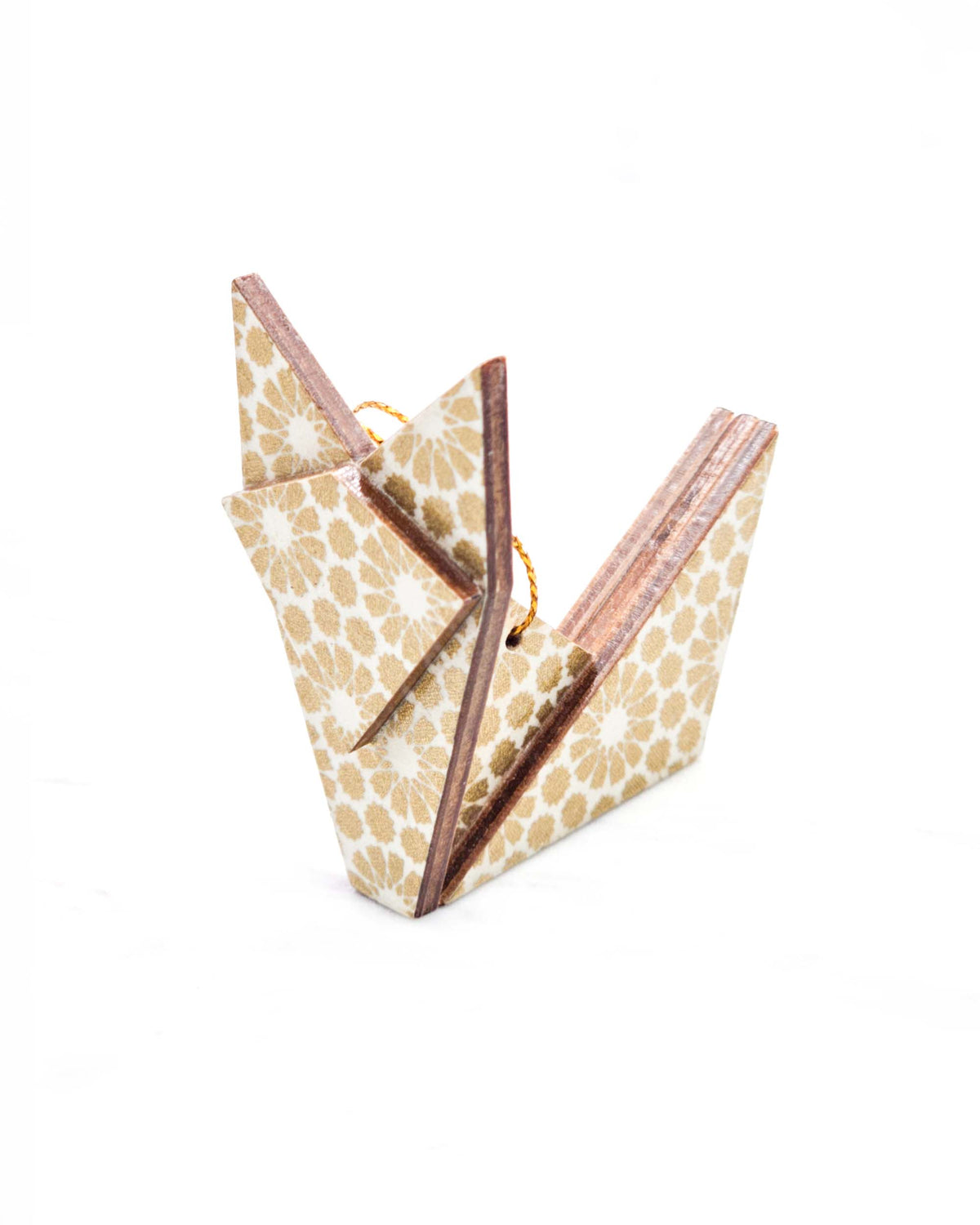 Small wooden origami fox ornament featuring metallic gold circles on a white background.