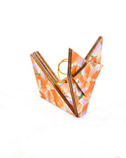 Small wooden origami fox ornament featuring orange and purple lotuses on a green background with metallic gold details.