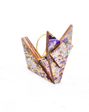 Small wooden origami fox ornament featuring small purple cherry blossoms and purple and white shippo and seigaiha patterns with metallic gold details.
