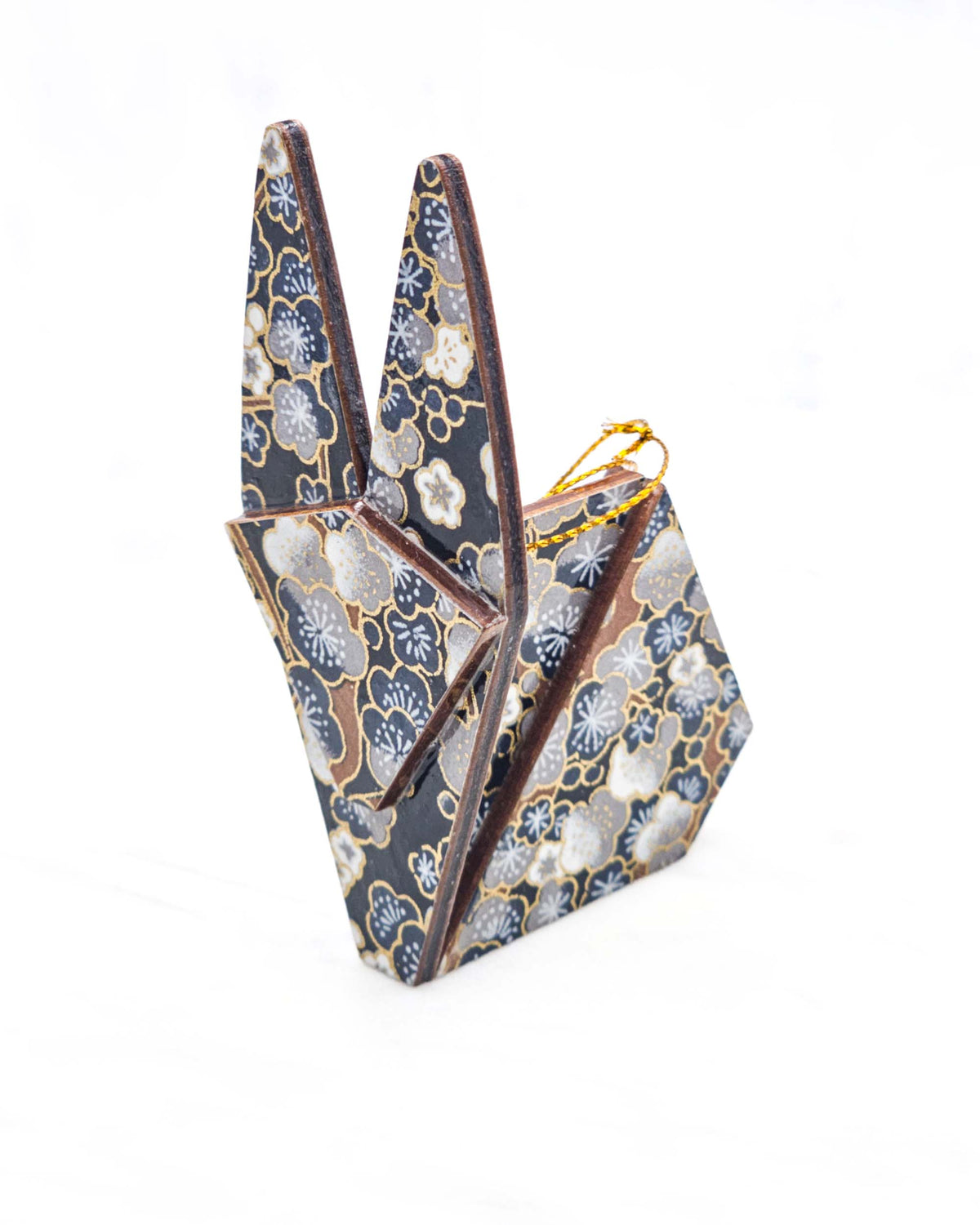 Large wooden origami rabbit ornament featuring blue and gray plum blossoms with brown branches on a dark blue background with metallic gold details