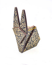 Large wooden origami rabbit ornament featuring a metallic gold floral motif on a black background.