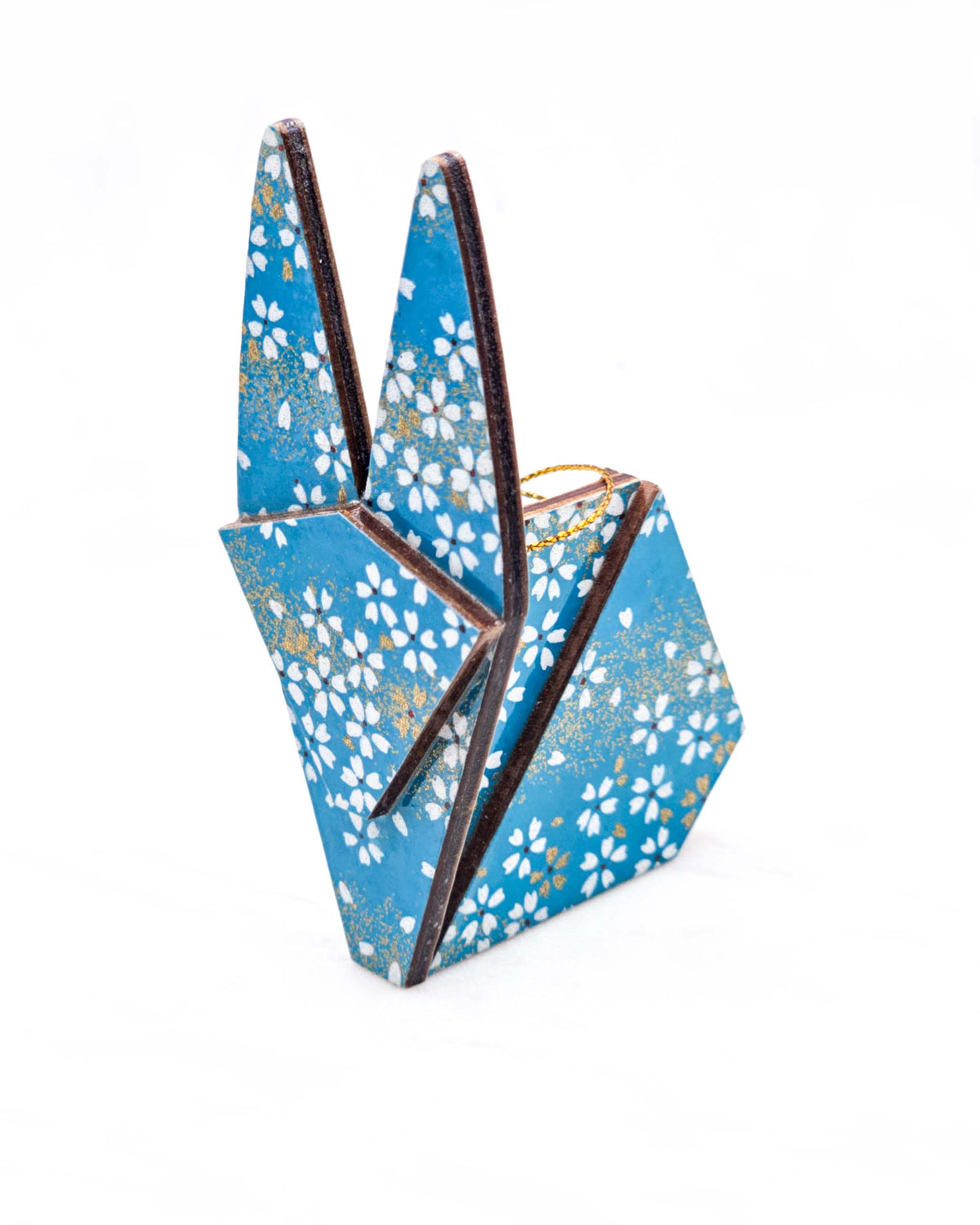 Large wooden origami rabbit ornament featuring small white and gold cherry blossoms on a blue background with metallic gold details.