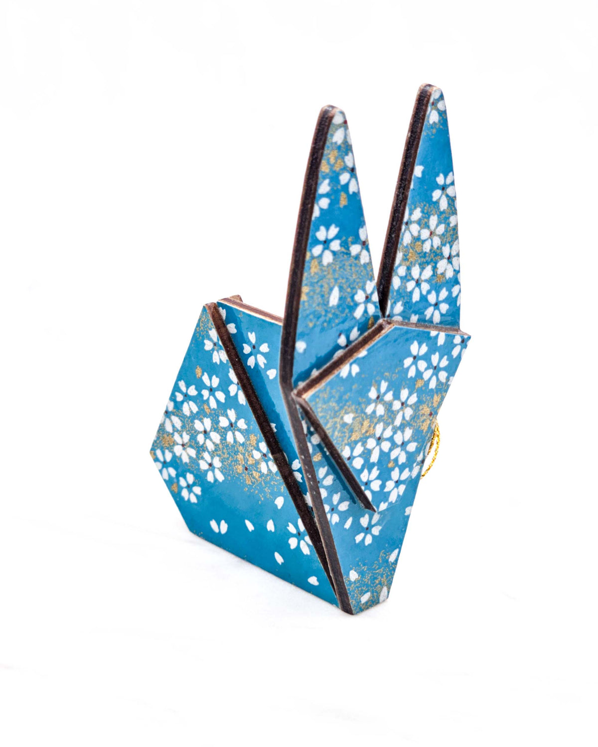 Large wooden origami rabbit ornament featuring small white and gold cherry blossoms on a blue background with metallic gold details.