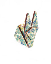 Small wooden origami rabbit ornament featuring small green and white momiji (maple leaves) on a light green background with metallic gold details.