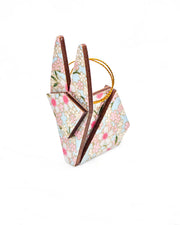 Small wooden origami rabbit ornament featuring white and pink cherry blossoms on a light blue background with metallic gold details.