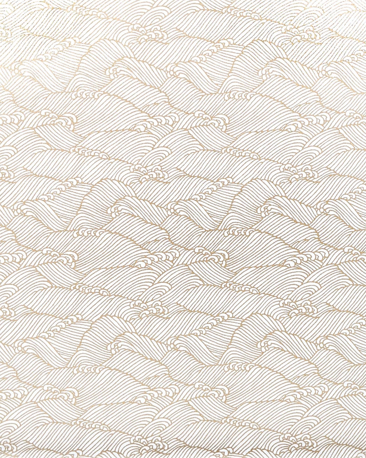Japanese chiyogami featuring small metallic gold waves on a white background.