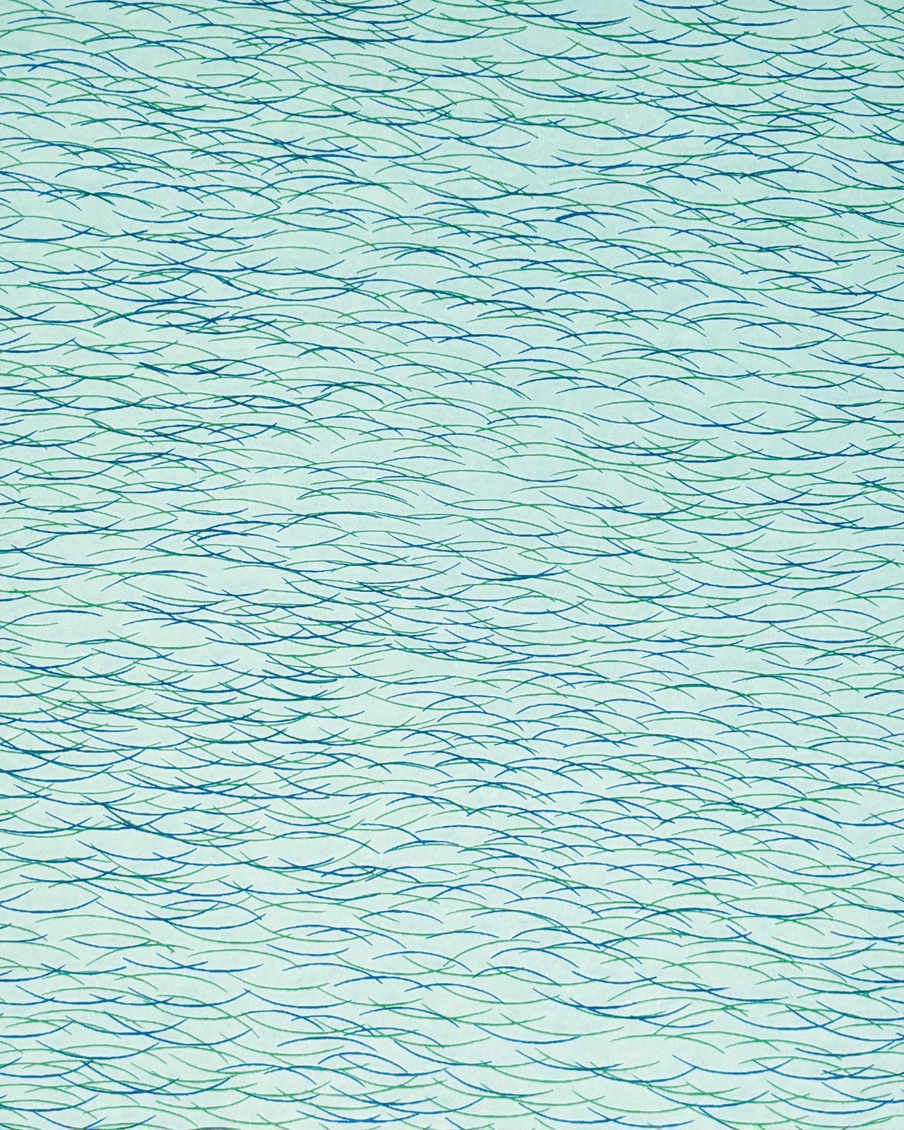 Japanese chiyogami paper featuring dark blue & green lines on a turquoise background.