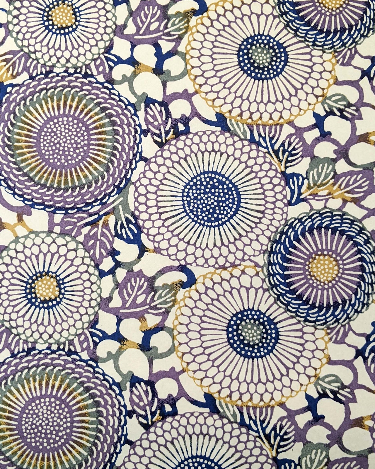 Japanese chiyogami paper featuring large purple & yellow zinnia flowers on a beige background.